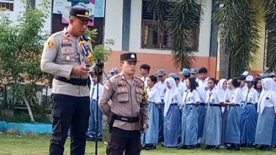 Kapolsek Dusun Timur Jadi Pembina Upacara di SMKN 2 Tamiang Layang
