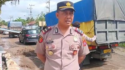 Polsek Dusun Timur Gandeng Rimau Group Timbun Jalan Berlubang di Jaweten